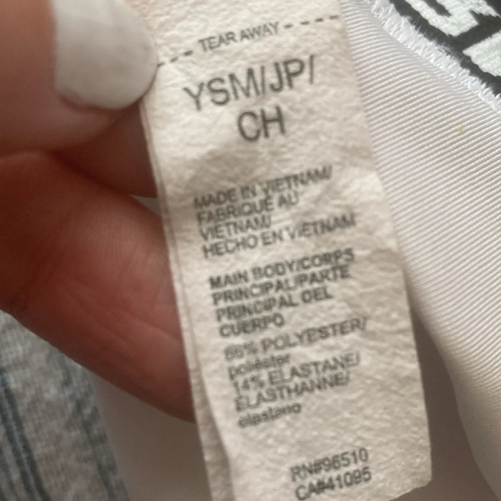 Under Armour youth, small white and black sports bra